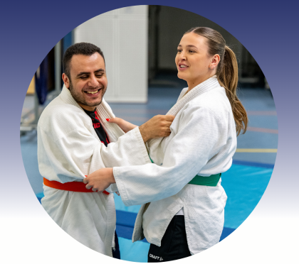 Vrouw en man op judomat - Visual Impaired Judo