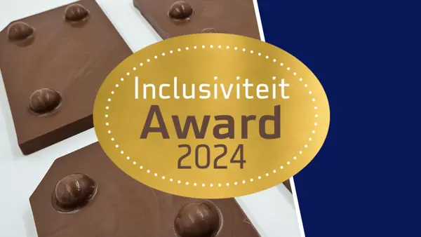 Foto van enkele braille chocoladeletters en daarop een vignet met de tekst "Inclusiviteit Award 2024" Foto van enkele braille chocoladeletters en daarop een vignet met de tekst "Inclusiviteit Award 2024"